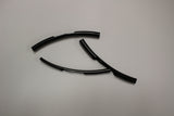 PVC tabs that protect a wire harness on a Porsche 911.